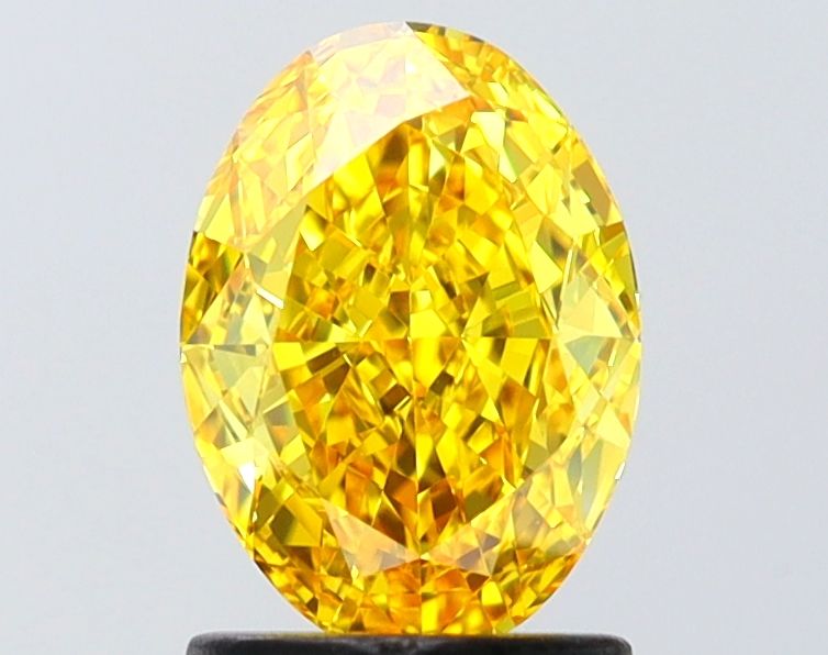 Lab-Grown Oval Diamond - 1.5 Carats, Fancy Vivid Yellow Color, VS1 Clarity - Certified by IGI - Report Number: LG654470195