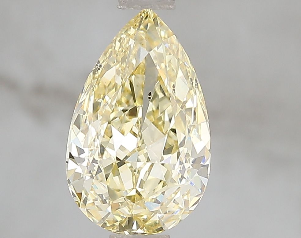 Lab-Grown Pear Diamond - 2.6 Carats, Fancy Intense Yellow Color, VS1 Clarity - Certified by IGI - Report Number: LG671493157