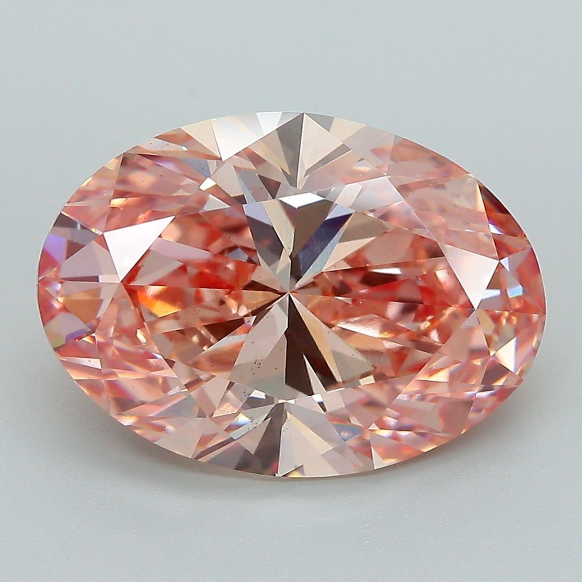 Lab-Grown Oval Diamond - 7.01 Carats, Fancy Vivid Pink Color, VS2 Clarity - Certified by IGI - Report Number: LG607368964