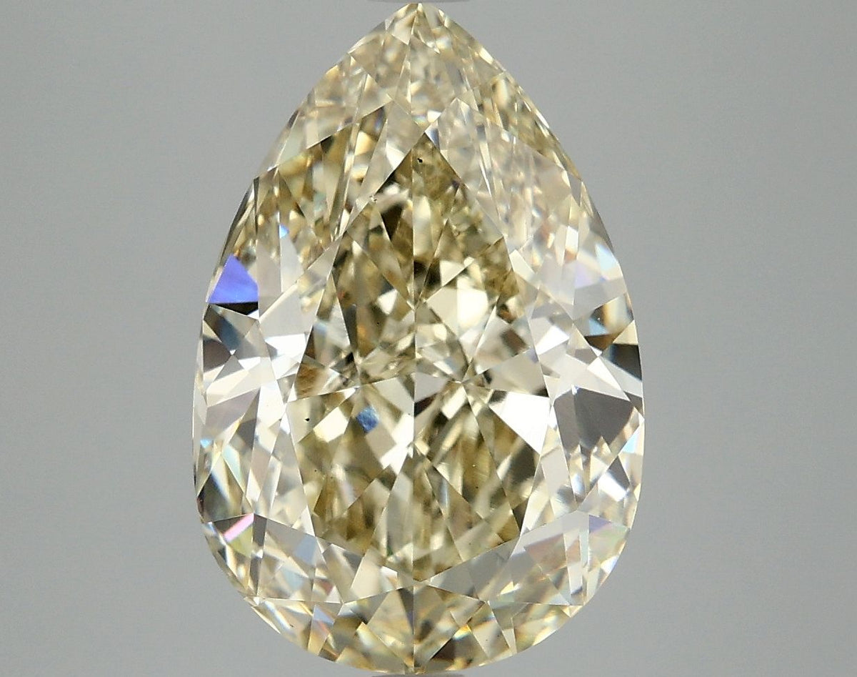 Lab-Grown Pear Diamond - 6.56 Carats, Fancy Yellow Color, VS1 Clarity - Certified by IGI - Report Number: LG674532064