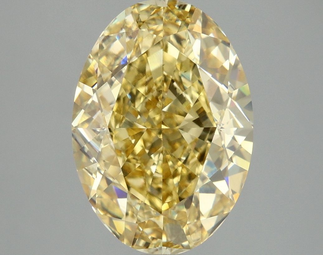 Lab-Grown Oval Diamond - 4.95 Carats, Fancy Vivid Yellow Color, VS2 Clarity - Certified by IGI - Report Number: LG677527634