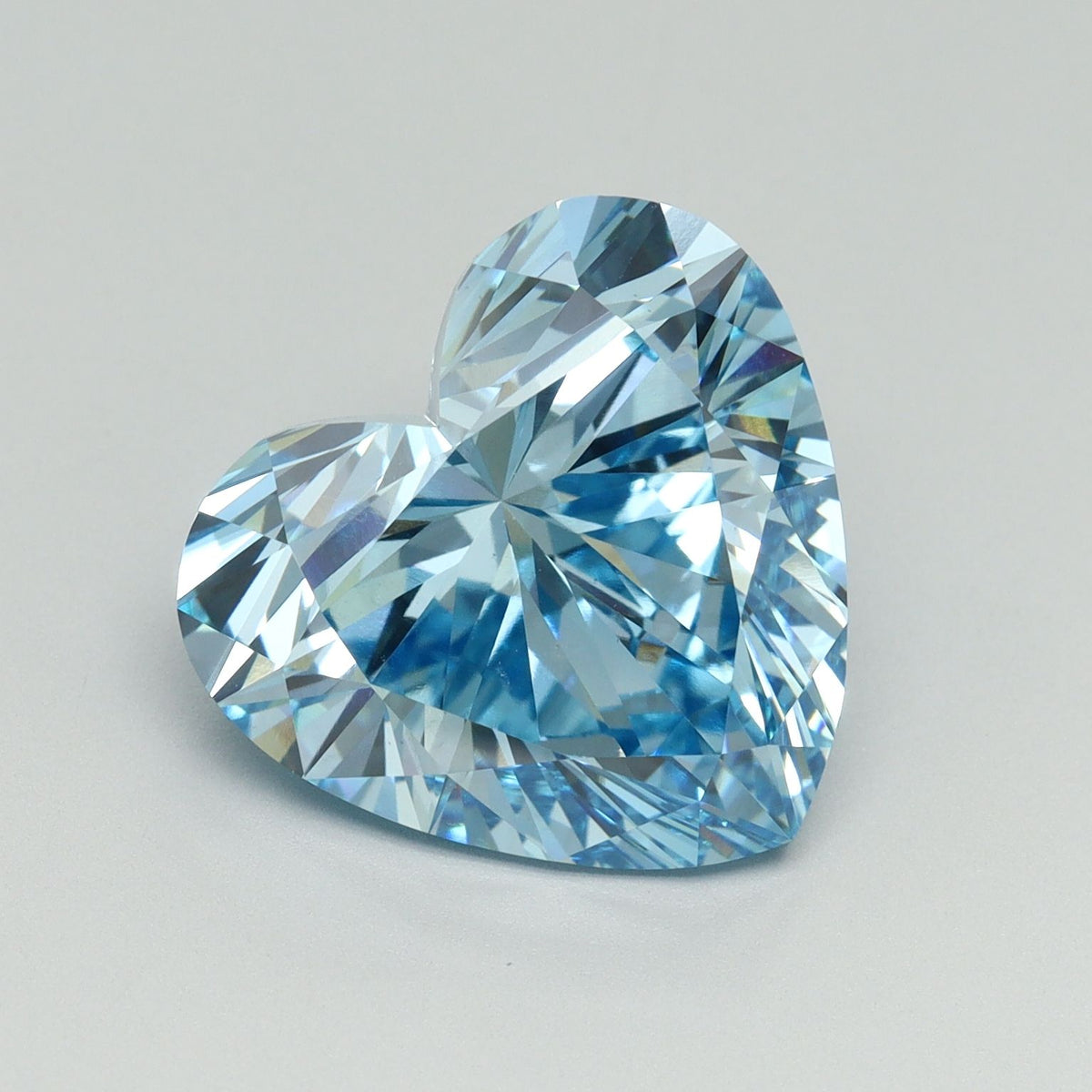 Lab-Grown Heart Diamond - 7.03 Carats, Fancy Vivid Blue Color, VS1 Clarity - Certified by IGI - Report Number: LG648436375