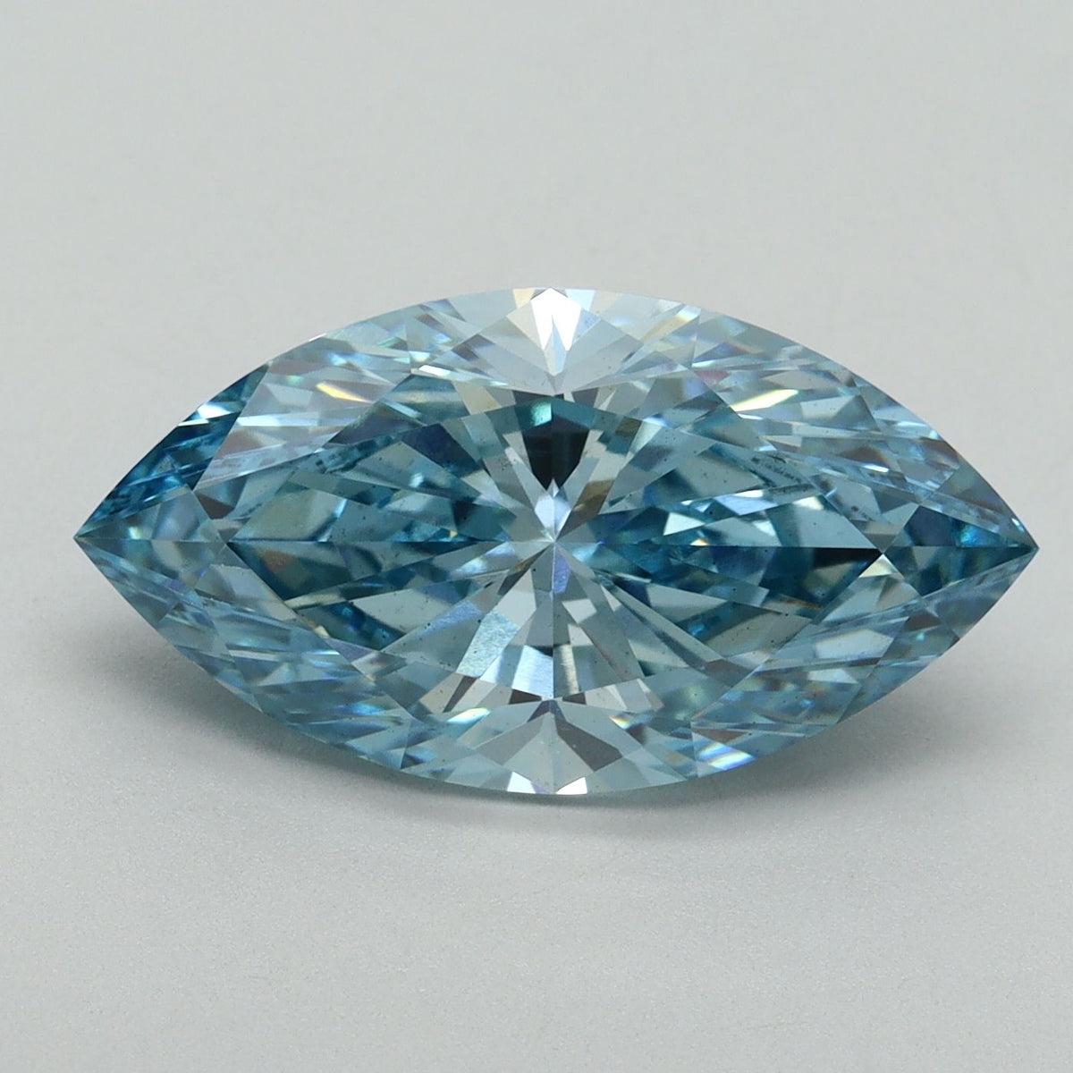 Lab-Grown Marquise Diamond - 5.01 Carats, Fancy Vivid Blue Color, VS1 Clarity - Certified by IGI - Report Number: LG636438476