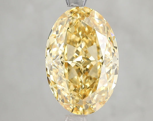 Lab-Grown Oval Diamond - 4.68 Carats, Fancy Vivid Yellow Color, VVS2 Clarity - Certified by IGI - Report Number: LG666432400