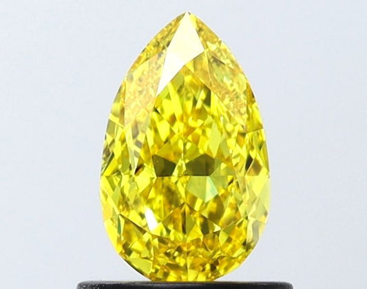 Lab-Grown Pear Diamond - 0.82 Carats, Fancy Vivid Yellow Color, VVS2 Clarity - Certified by IGI - Report Number: LG646485499