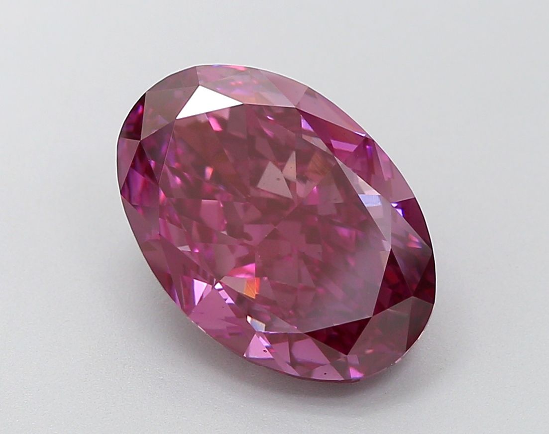 Lab-Grown Oval Diamond - 5.11 Carats, Fancy Vivid Brownish Pink Color, VS2 Clarity - Certified by IGI - Report Number: LG647483091