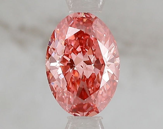 Lab-Grown Oval Diamond - 1.03 Carats, Fancy Vivid Pink Color, VS1 Clarity - Certified by IGI - Report Number: LG671493196