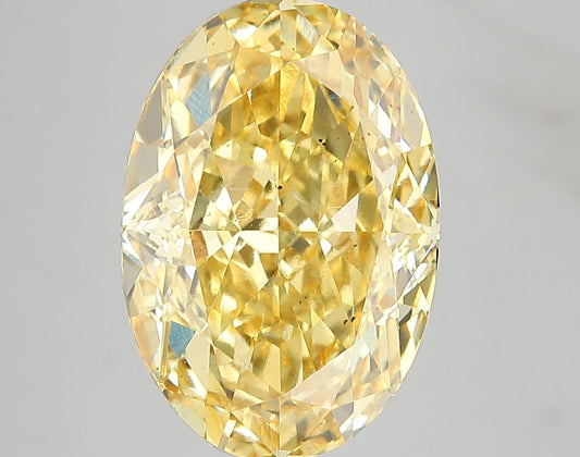 Lab-Grown Oval Diamond - 7.07 Carats, Fancy Vivid Yellow Color, VS2 Clarity - Certified by IGI - Report Number: LG671478720