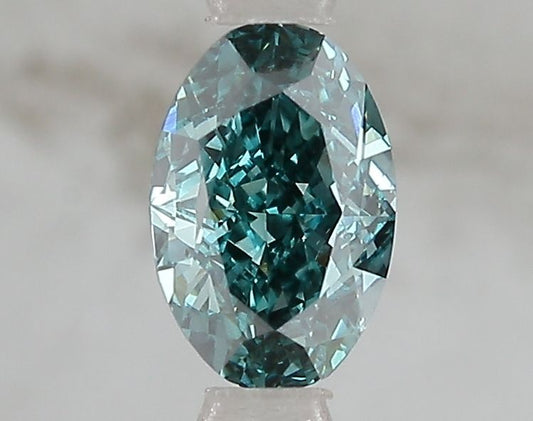 Lab-Grown Oval Diamond - 1.1 Carats, Fancy Vivid Blue Green Color, VS1 Clarity - Certified by IGI - Report Number: LG671493213