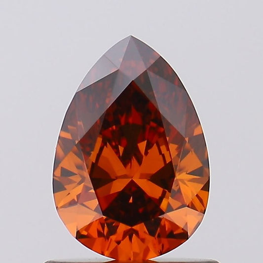 Lab-Grown Pear Diamond - 0.78 Carats, Fancy Vivid Orange Color, VS1 Clarity - Certified by IGI - Report Number: LG591359429