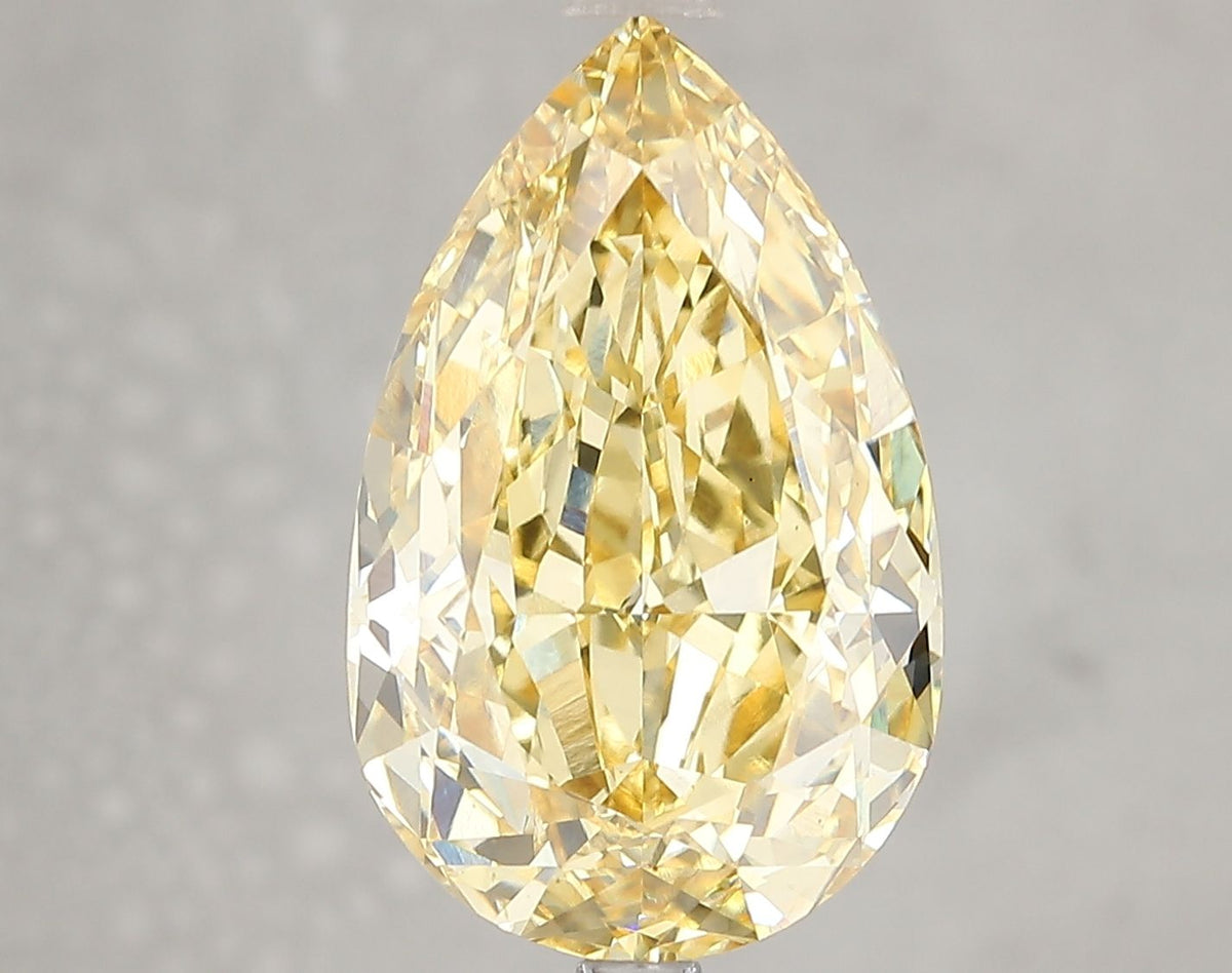 Lab-Grown Pear Diamond - 7.03 Carats, Fancy Vivid Yellow Color, VVS2 Clarity - Certified by IGI - Report Number: LG660453365