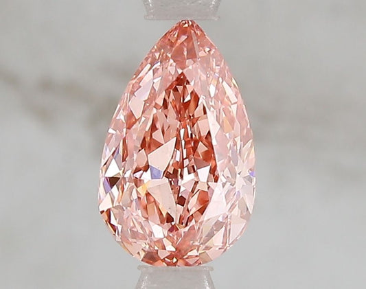 Lab-Grown Pear Diamond - 1.03 Carats, Fancy Vivid Pink Color, VS1 Clarity - Certified by IGI - Report Number: LG671493346