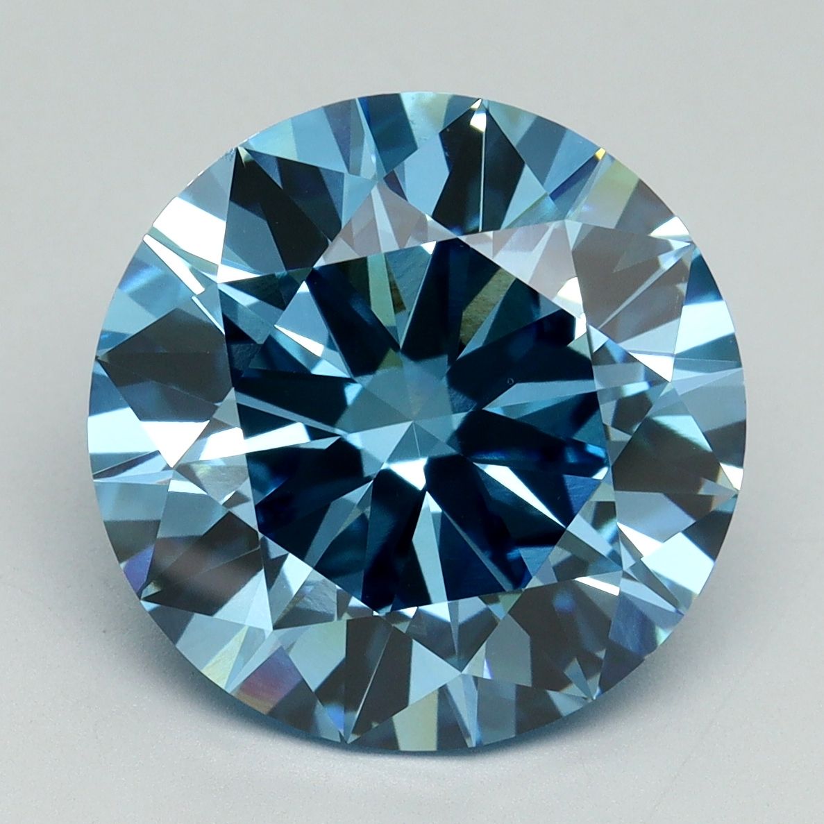 Lab-Grown Round Diamond - 7.08 Carats, Fancy Vivid Blue Color, VVS2 Clarity - Certified by IGI - Report Number: LG644438475