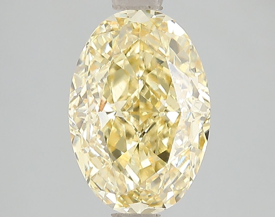 Lab-Grown Oval Diamond - 4.53 Carats, Fancy Vivid Yellow Color, VS2 Clarity - Certified by IGI - Report Number: LG671493376