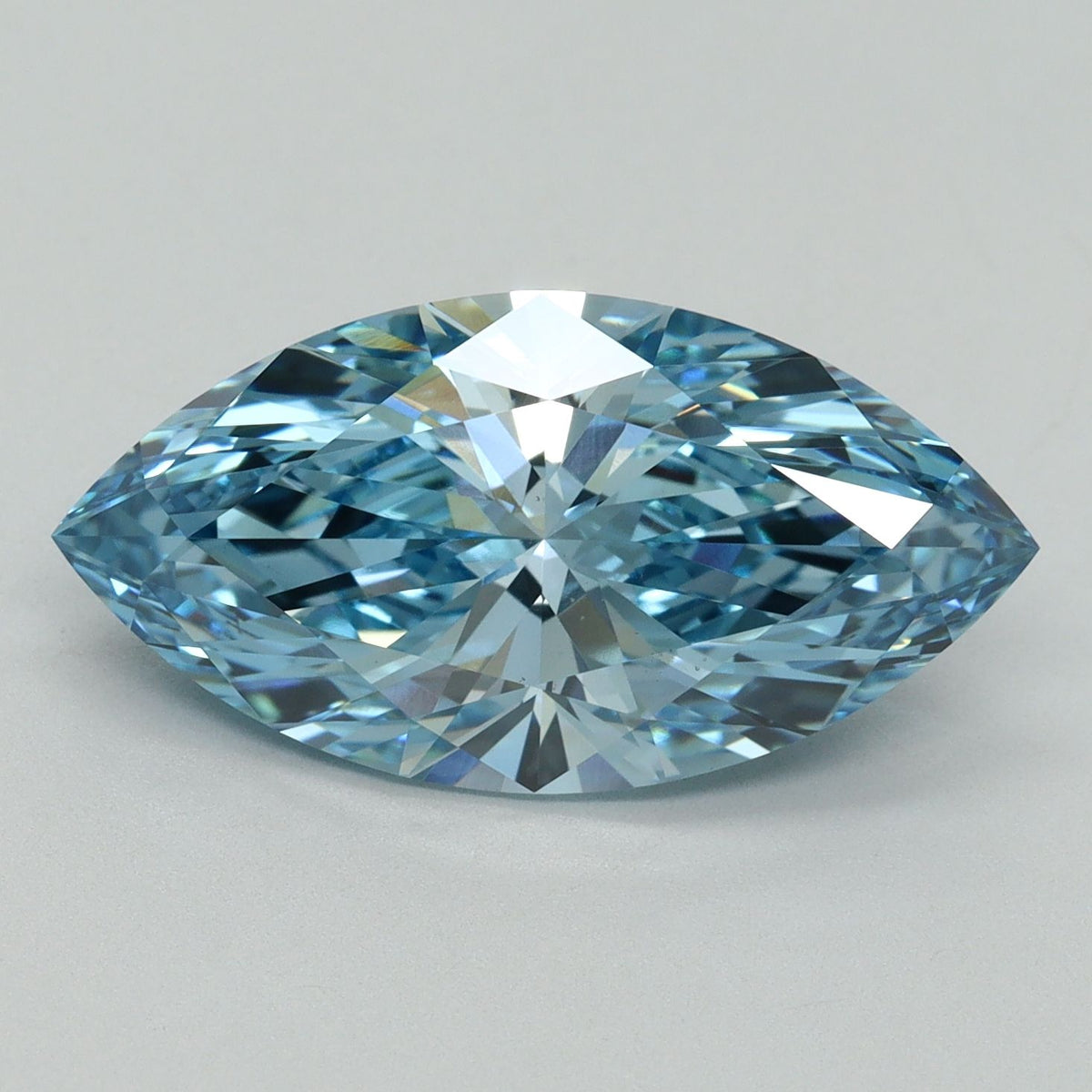 Lab-Grown Marquise Diamond - 5.02 Carats, Fancy Vivid Blue Color, VVS2 Clarity - Certified by IGI - Report Number: LG636438475
