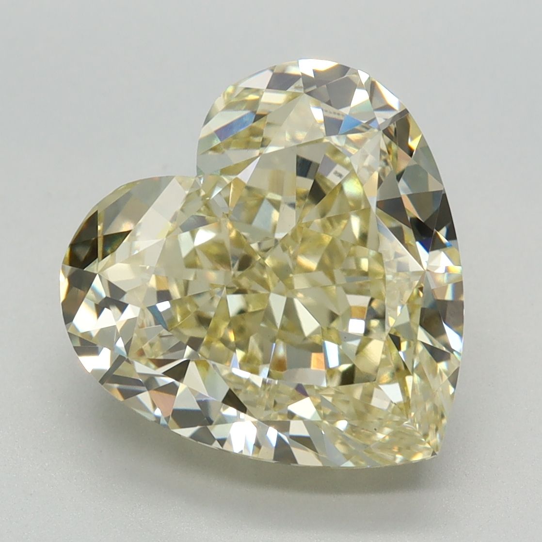 Lab-Grown Heart Diamond - 5.64 Carats, Fancy Intense Yellow Color, VS1 Clarity - Certified by IGI - Report Number: LG636472930
