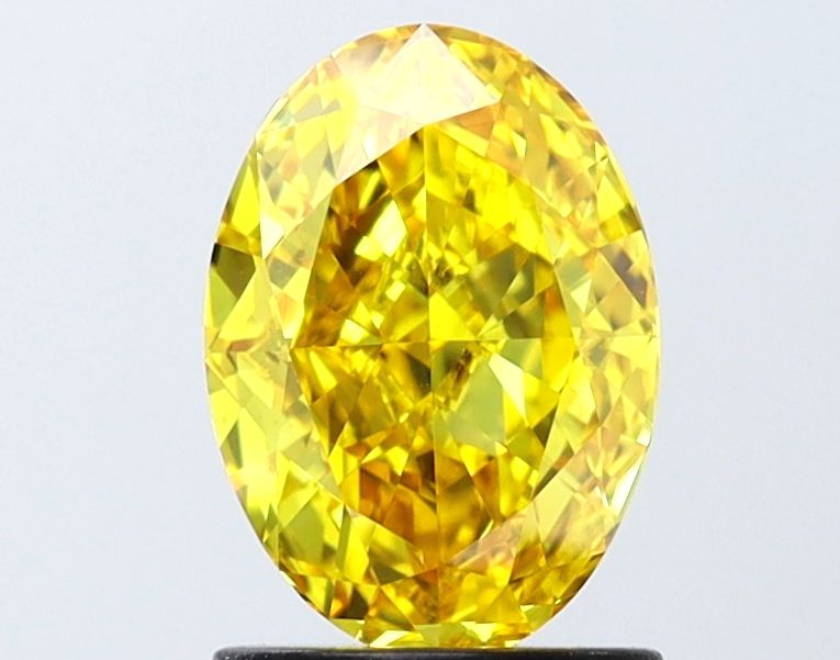 Lab-Grown Oval Diamond - 1.47 Carats, Fancy Vivid Yellow Color, VS1 Clarity - Certified by IGI - Report Number: LG646473148