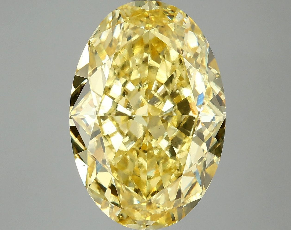 Lab-Grown Oval Diamond - 8.1 Carats, Fancy Vivid Yellow Color, VS2 Clarity - Certified by IGI - Report Number: LG674531742