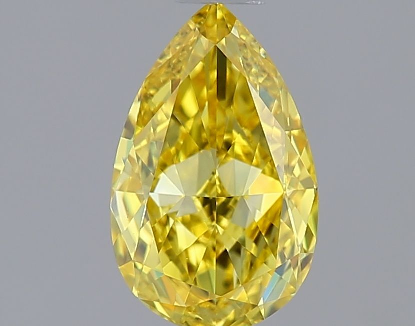 Lab-Grown Pear Diamond - 0.71 Carats, Fancy Vivid Yellow Color, VS1 Clarity - Certified by IGI - Report Number: LG640445936