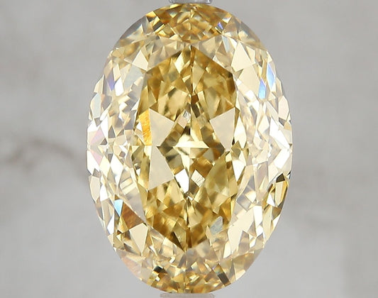 Lab-Grown Oval Diamond - 7.05 Carats, Fancy Vivid Yellow Color, VS1 Clarity - Certified by IGI - Report Number: LG671478731