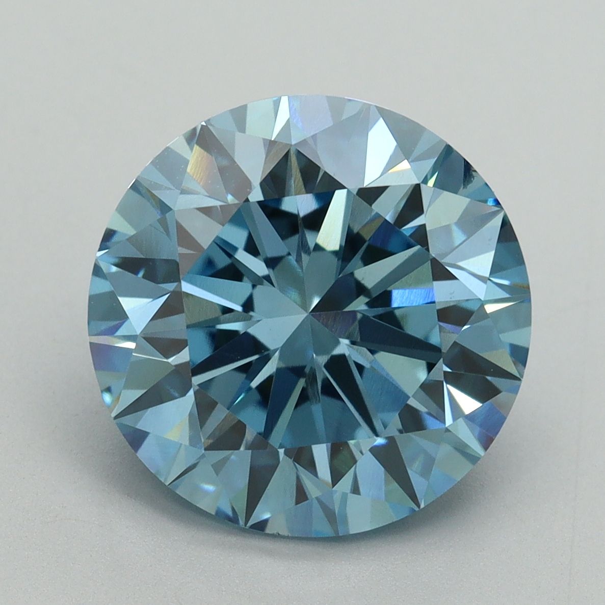 Lab-Grown Round Diamond - 6.04 Carats, Fancy Vivid Blue Color, VS2 Clarity - Certified by IGI - Report Number: LG644442230