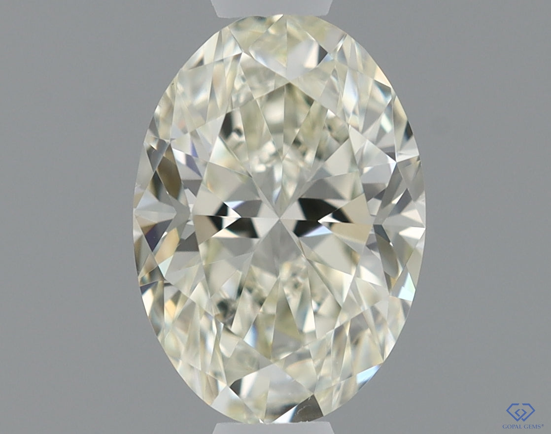 Natural Mined OVAL Diamond - 0.61 Carats, K Color, VS1 Clarity - Timeless Beauty and Exceptional Brilliance - IGI Certified